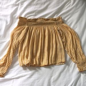 Off the shoulder, cropped, shirt.